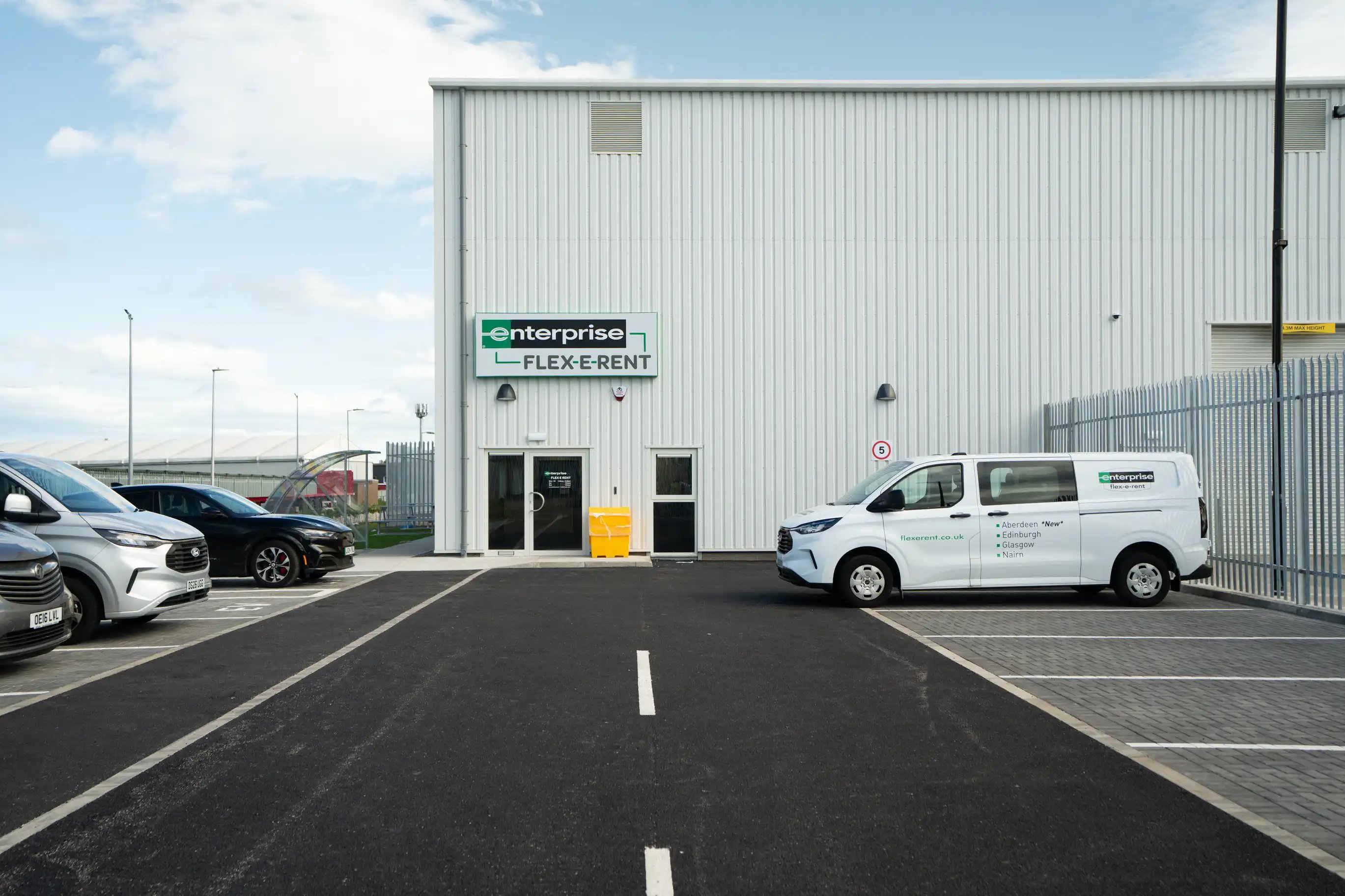 Enterprise Flex-E-Rent Aberdeen depot building with branded service vehicle parked outside the facility
