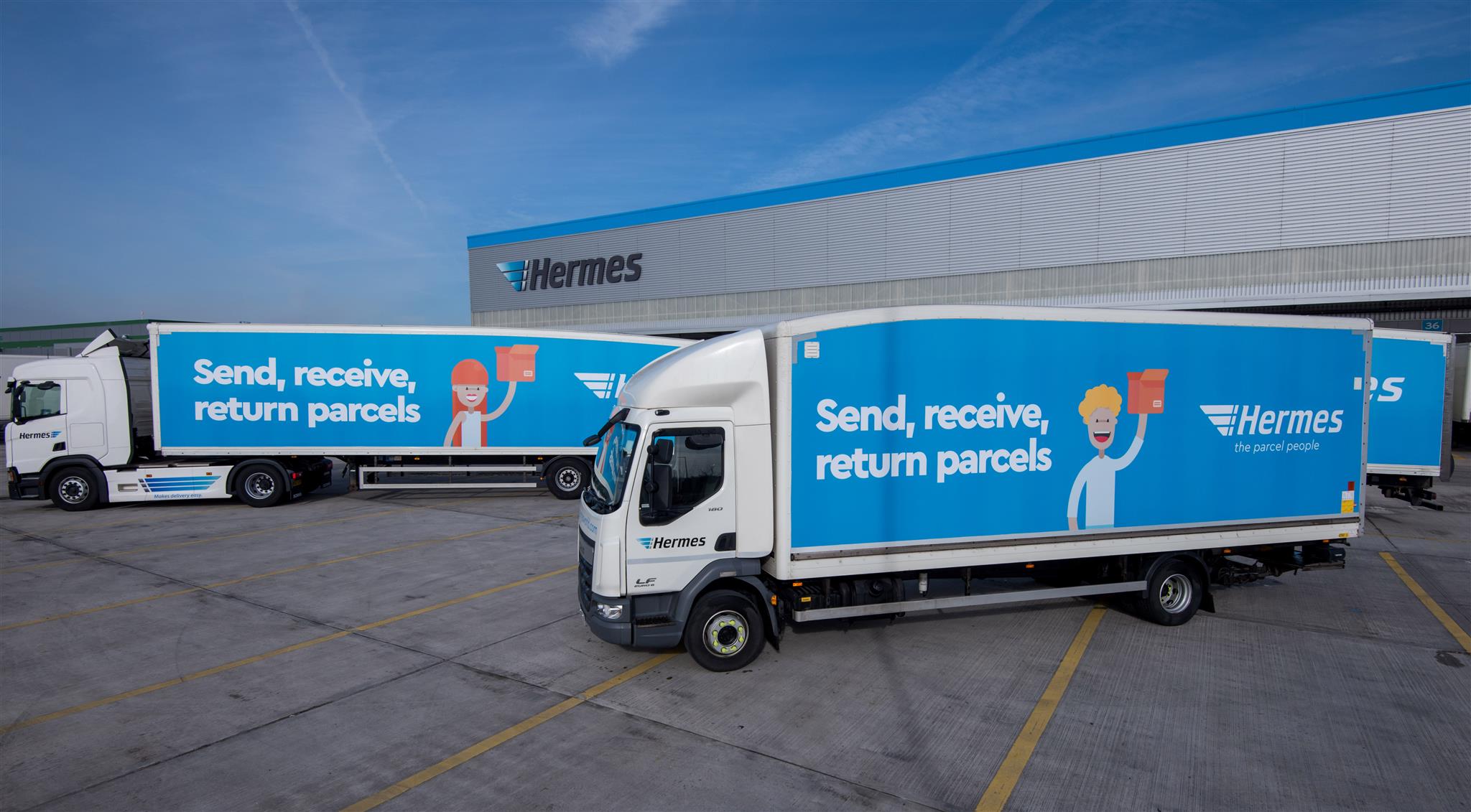 Picture of two Flex-E-Rent HGVs with Hermes branding